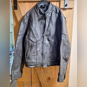 A US Made Co. Black leather jacket in a size 44. Heavyweight Vintage. Pre-loved